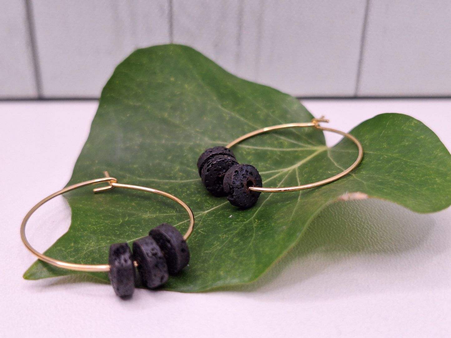 Black Lava Roundel Hoops on 316L Gold Surgical Steel, Hypoallergenic Earrings for Women, 25mm Gold Earring Gifts 6mm Lava Stone Jewellery.